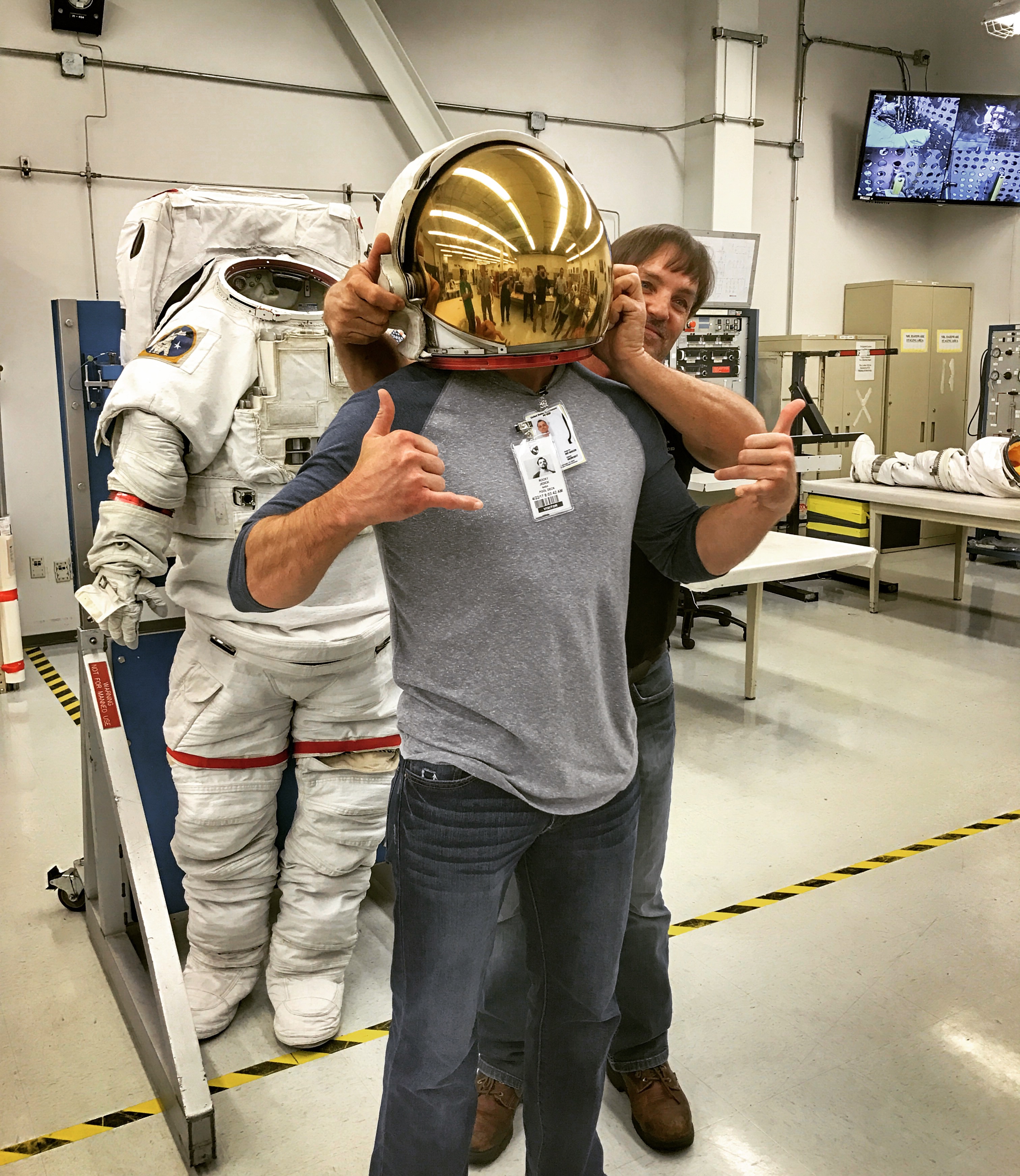 Dr. Rocky Jedick at NASA Johnson Space Center with space suit helmet